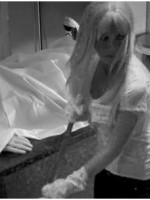 LindsayMorguethumb 150x200 Video: Lindsay Lohan Sucks a Bone at L.A. Morgue