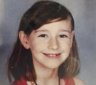 This undated photo provided by the Santa Cruz Police Department shows missing Madyson "Maddy" Middleton, from Santa Cruz, Calif. Madyson Middleton was last seen Sunday afternoon, July 26, 2015, riding a scooter outside the Tannery Arts Center in Santa Cruz, a beach town along the Northern California coast. The 4-foot-tall, a 50-pound child, has long brown hair, which was pulled to the side in a braid, and dark eyes. She was wearing a purple dress, black leggings, black flip-flops and a black helmet when she vanished. (Courtesy of Santa Cruz Police Department via AP)