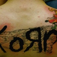  People Who Dared To Tattoo Music Stars On Their Bodies