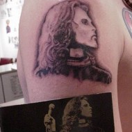 bad band tattoos 8 190x190 People Who Dared To Tattoo Music Stars On Their Bodies