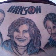 bad band tattoos 9 190x190 People Who Dared To Tattoo Music Stars On Their Bodies