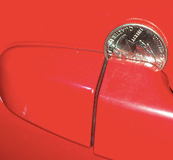 coin car door handle trick