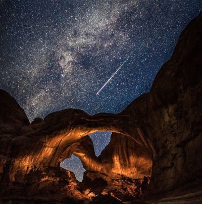 Double Arch in Arches National Park during the Perseid Meteor Shower. The arches were lit with a flashlight in a separate exposure after seeing the meteor streak across the sky