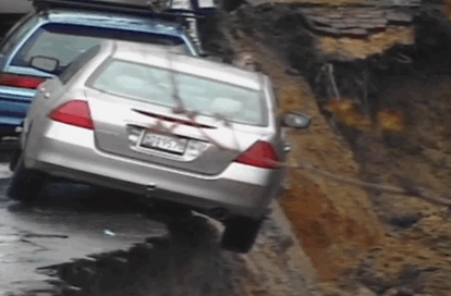 Incredible Sinkhole in Baltimore Sends Cars Incredible