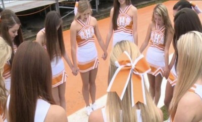 Oneida Tennessee high school cheerleaders pray before game 5