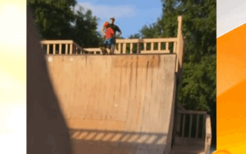dad kicks son skatepark