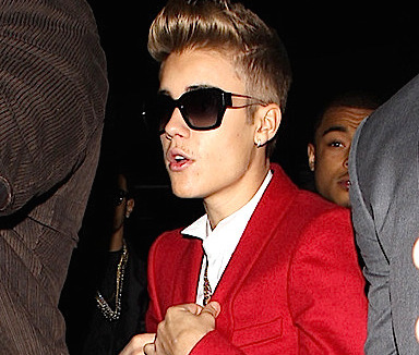 EXCL Justin Bieber's bodyguard roughs up photographer again