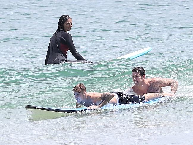 EXCLUSIVE: Justin Bieber goes surfing in Australia
