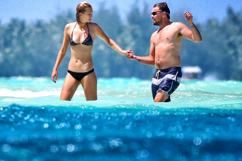 EXCLUSIVE: Leonardo DiCaprio and Toni Garnn kissing on a beach on Bora Bora