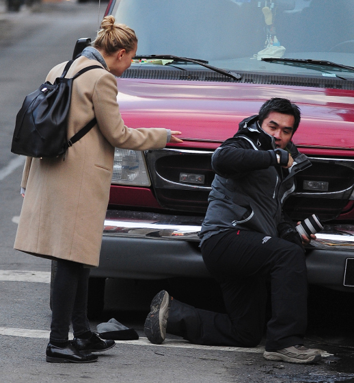 EXCLUSIVE: Sam Worthington and Lara Bingle Punch a Photographer in the Face in NYC