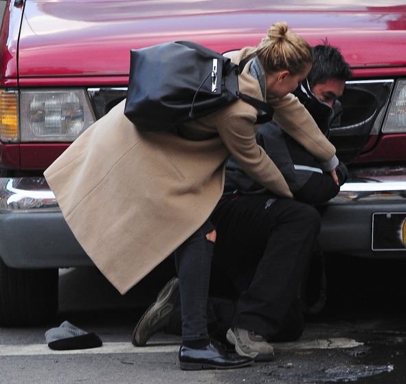 EXCLUSIVE: Sam Worthington and Lara Bingle Punch a Photographer in the Face in NYC